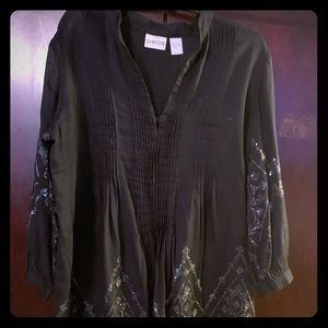 Tunic with light embellishments